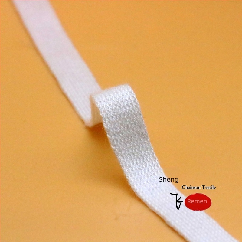 Elastična pletena traka od mercerisiranog pamuka, širine 1–4 cm, crno-bijela.