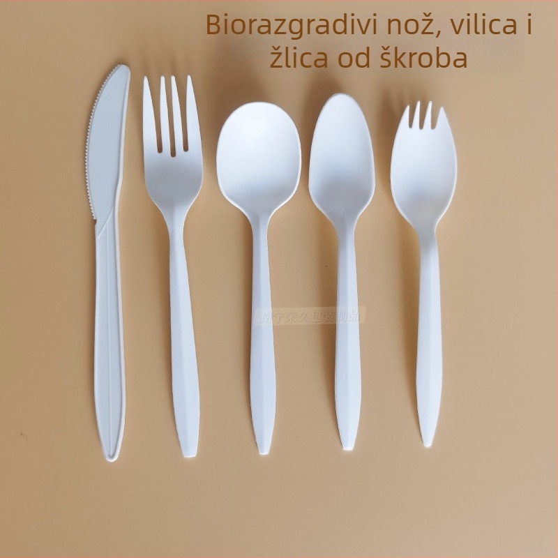 Debljani bijeli jednokratni pribor (nož, vilica, žlica) od kukuruznog škroba; biološki razgradivo.