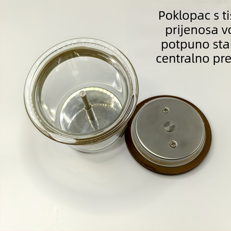 Čajnik s unutarnjim staklenim slojem od visokog borosilikatnog stakla i poklopcem od smole s motivom prijenosa vode