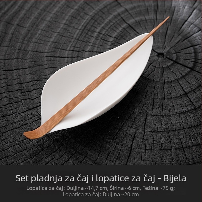 Keramički dodaci za čajnu ceremoniju: žličica za čaj, žličica s dizajnom lotosa, dijelitelj čaja i alati za kušanje
