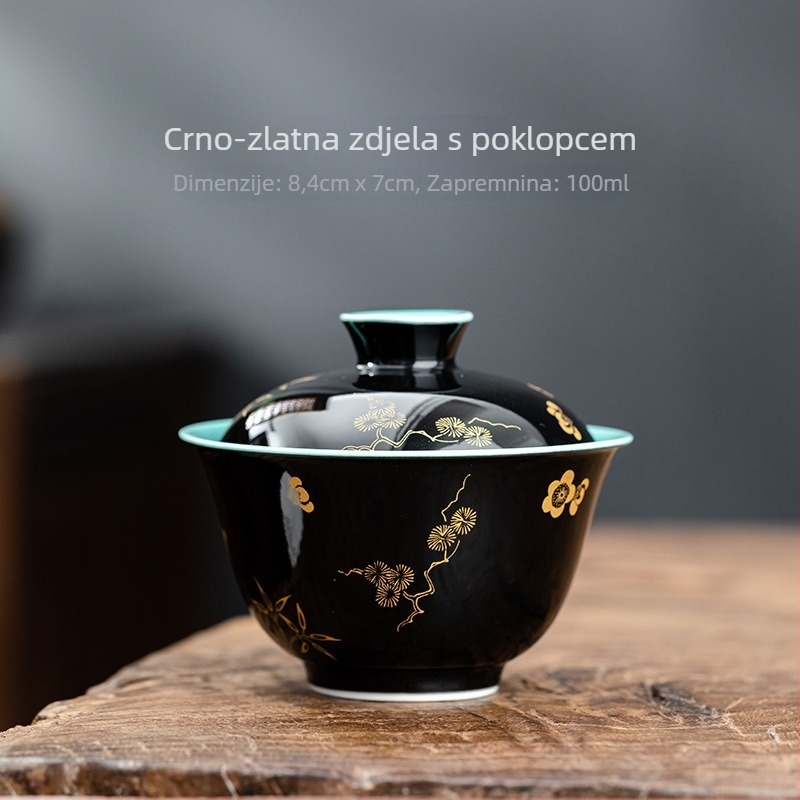 Celadon keramički čajni set s crnom glazurom i zlatnim motivom cvijeta šljive; uključuje čajnik s poklopcem, zdjelu za čaj i šalice