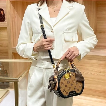 Ženska PU kožna mala okrugla crossbody torbica s otiskom, vintage stil – trend 2025