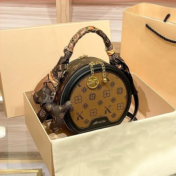 Ženska PU kožna mala okrugla crossbody torbica s otiskom, vintage stil – trend 2025