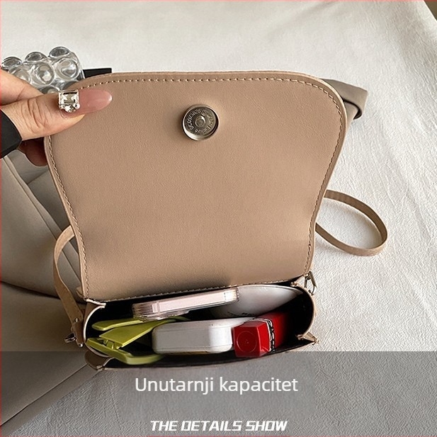 Ženska saddle torbica za jesen-zimu 2025, moderna tekstura, preko ramena ili crossbody, srednja veličina, urbani stil