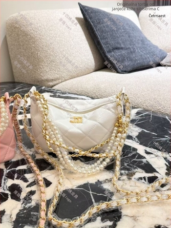 Xiangjia torbica od ovčje kože s lancem od perli i romboidnom vezenjem — vintage mala crossbody torbica za žene, proljeće 2026