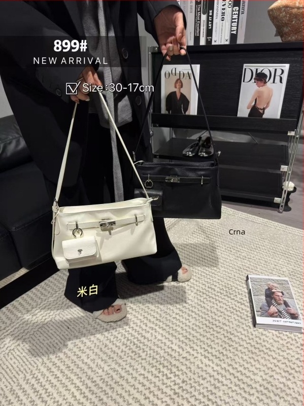 Ženska Kelly torbica od prave kože, srednje veličine, jednostavna naramenica crossbody, korejskog stila, proljeće–ljeto 2026, horizontalan kvadratni silueta, zatvaranje zipom, poliester podstava, unutarnji džep sa zipom i pretinac za ID, moderan dizajn