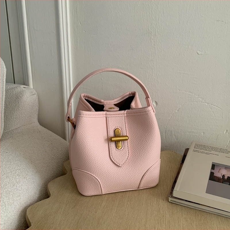 PU bucket torba 2026 proljeće, crossbody, ramena i ručka, gradski minimalistički stil, srednja veličina