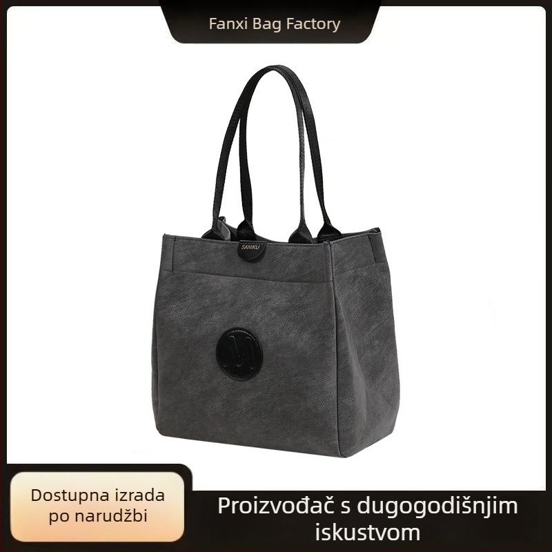 Ženska denim bucket torba preko ramena, svestrana i elegantna za 2026