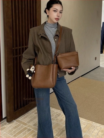 Ženska bucket torba s nišnim dizajnom, minimalistička kožna torba, jesen-zima 2025, retro urbani crossbody torba s jednim remenom