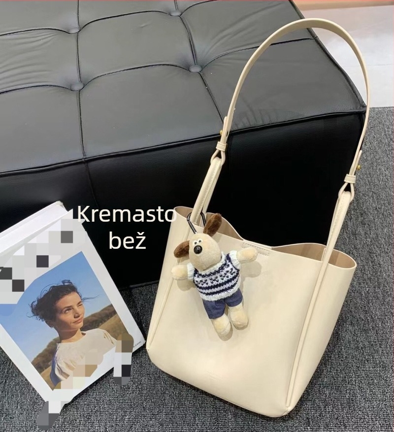 Ženska bucket torba s nišnim dizajnom, minimalistička kožna torba, jesen-zima 2025, retro urbani crossbody torba s jednim remenom