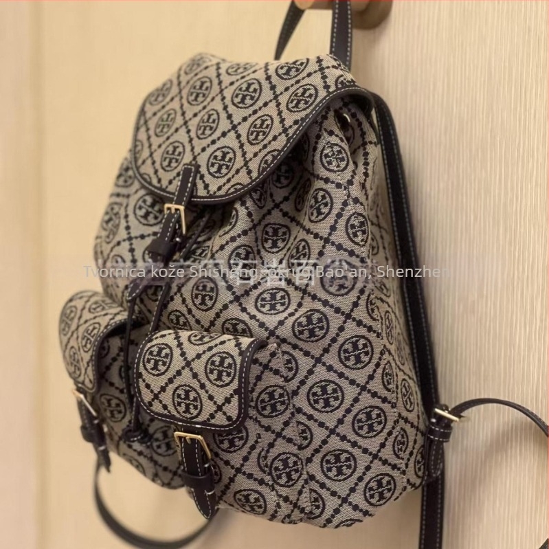 TB ženska torba od platna s monogramom, model 26 — lagana bucket torba s vezicom i presjeka za rameni