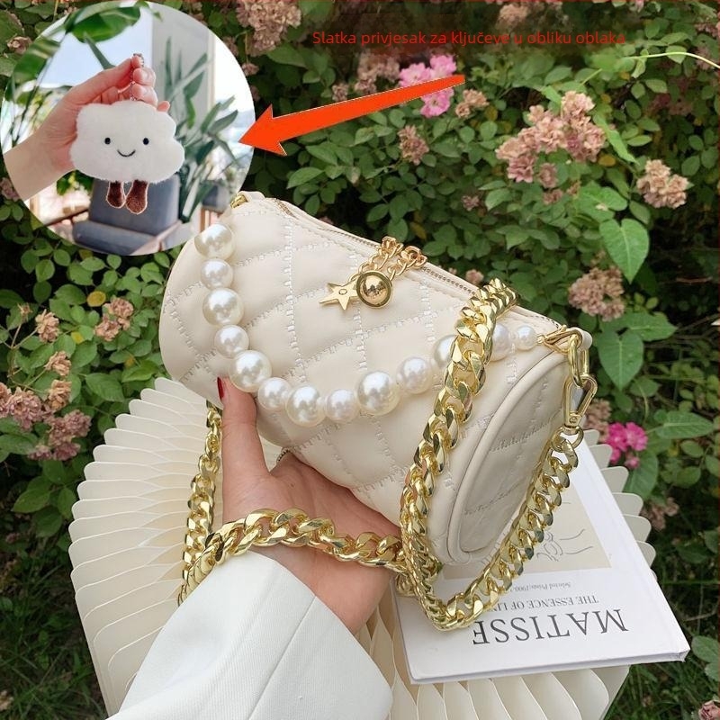 Ženska mini crossbody torbica s bisernim lancem, ljeto, cilindrični oblik, luksuzan izgled