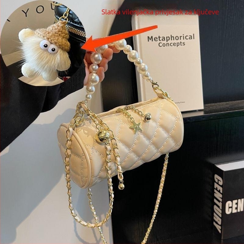 Ženska mini crossbody torbica s bisernim lancem, ljeto, cilindrični oblik, luksuzan izgled