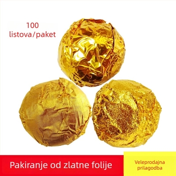 Zlatno aluminijska folija za omatanje čokoladnih bombona i sezam kuglica, sjajna površina, fina karirana šara i tekstura korice naranče