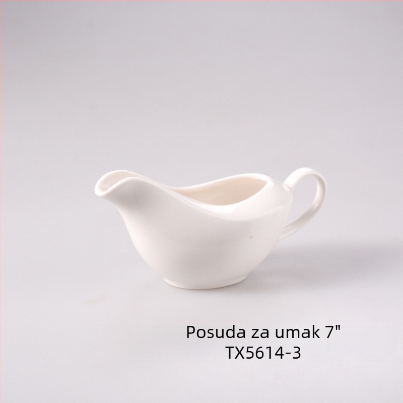 Bijeli porculanski set začina: solnjak, bočica za ulje, posuda za umak, posuda za čačkalice i zdjela za dinstanje