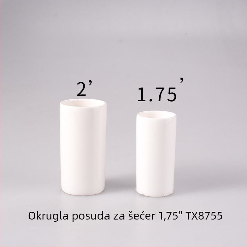 Bijeli porculanski set začina: solnjak, bočica za ulje, posuda za umak, posuda za čačkalice i zdjela za dinstanje