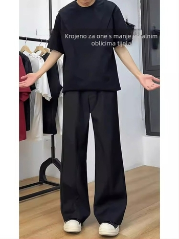 Crne muške hlače poslovnog stila s elegantnim drapanjem, čisti kroj, lagani ljetni materijal, ravni kroj uz blago proširenje nogavica