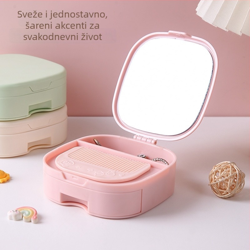 Prijenosno višenamjensko ogledalo za šminkanje s zaštitom od prašine, ugrađenim češalom i ladicom s odjeljcima za nakit.