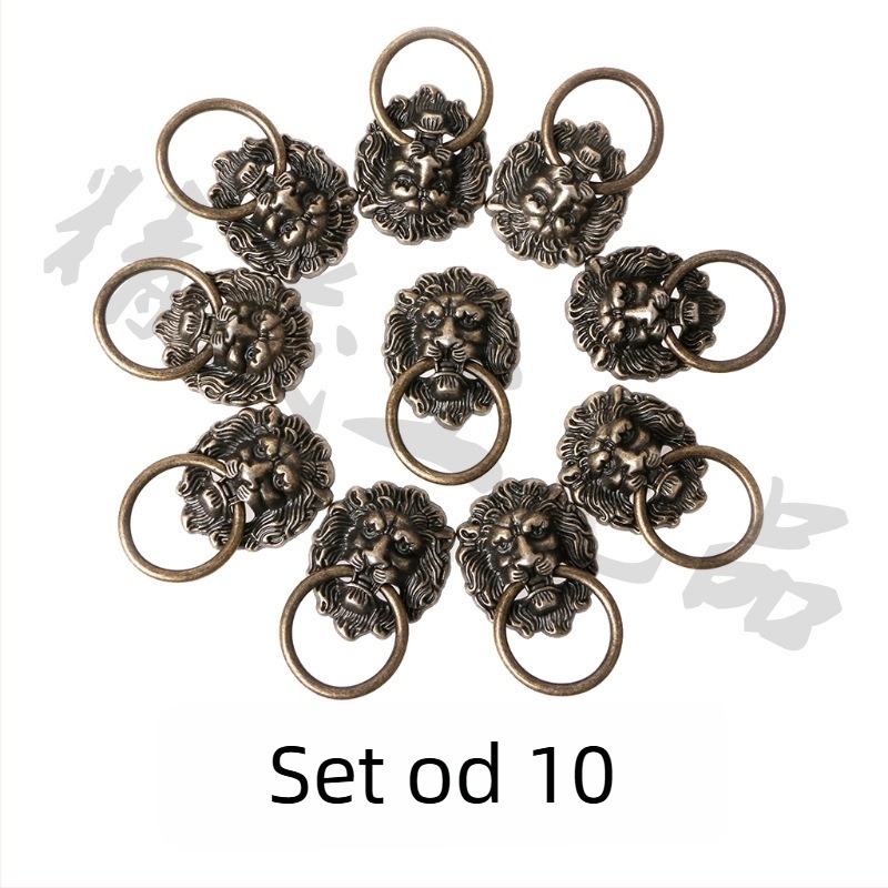 Set od 10 drški s glavom lava, brončane patine, za ormariće i vrata garderobe.