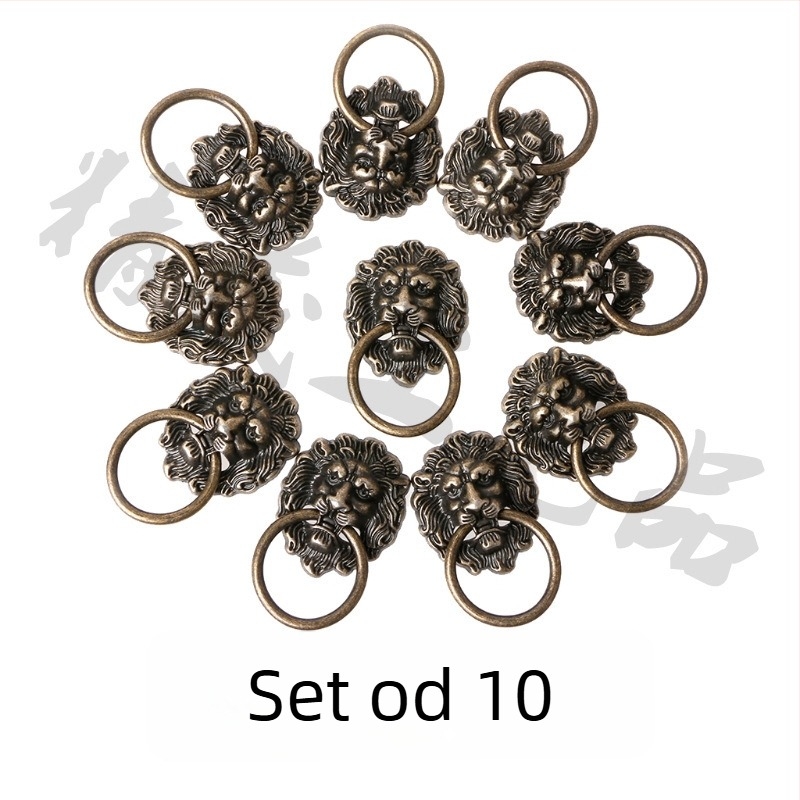 Set od 10 drški s glavom lava, brončane patine, za ormariće i vrata garderobe.