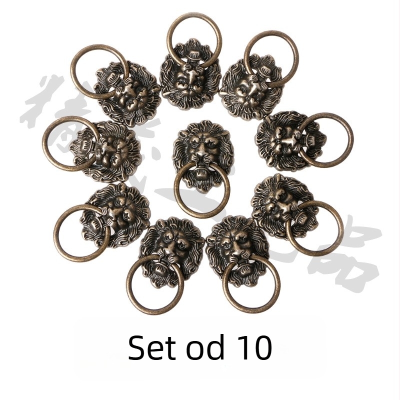 Set od 10 drški s glavom lava, brončane patine, za ormariće i vrata garderobe.