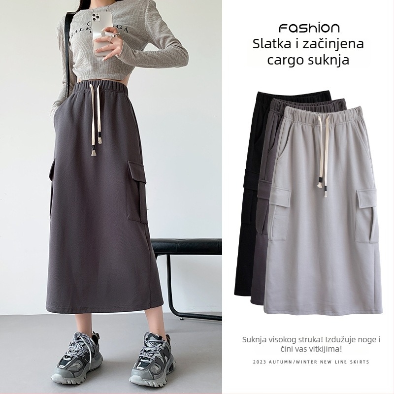 Ženska suknja u američkom retro radnom stilu, visokim pojasom, A-linija s prorezom, srednja duljina, elegantan svakodnevni stil
