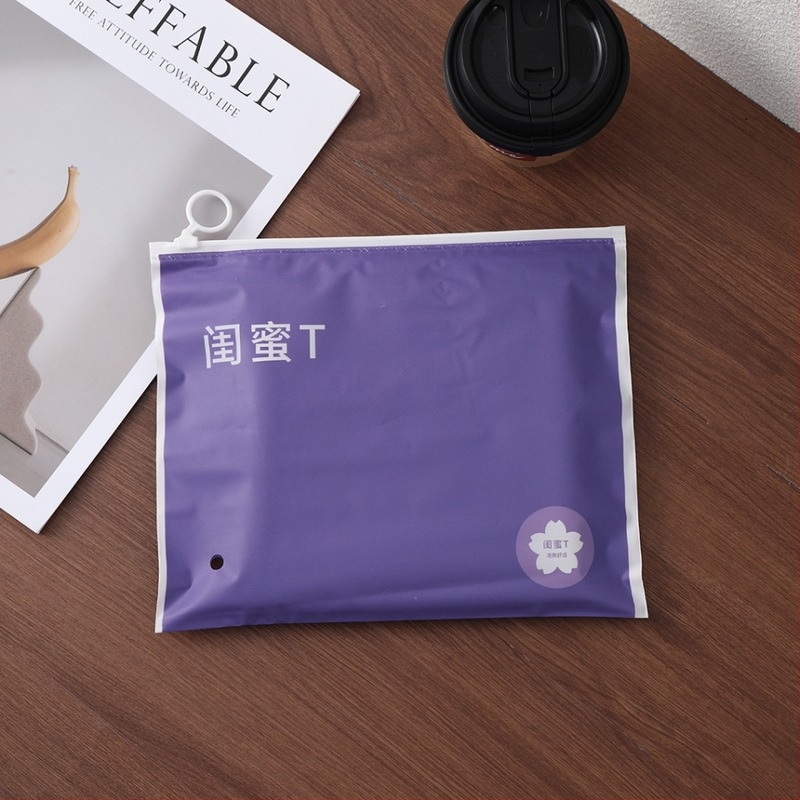 Visoko prozirne zip vrećice za odjeću, otporne na pucanje; ljubičaste zip vrećice (50 kom.) i ružičaste prozirne zip vrećice (50 kom.), dimenzije 25×21 cm i 35×23 cm.
