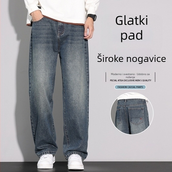 Elastične muške traperice — ravni kroj, opuštena silueta, visok struk, svakodnevni zimski stil pustinjskog krajolika