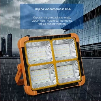 Vanjski solarni LED floodlight, prijenosni s mogućnošću punjenja; za kampiranje, putovanja i hitne situacije; kompakna žuta svjetlost.