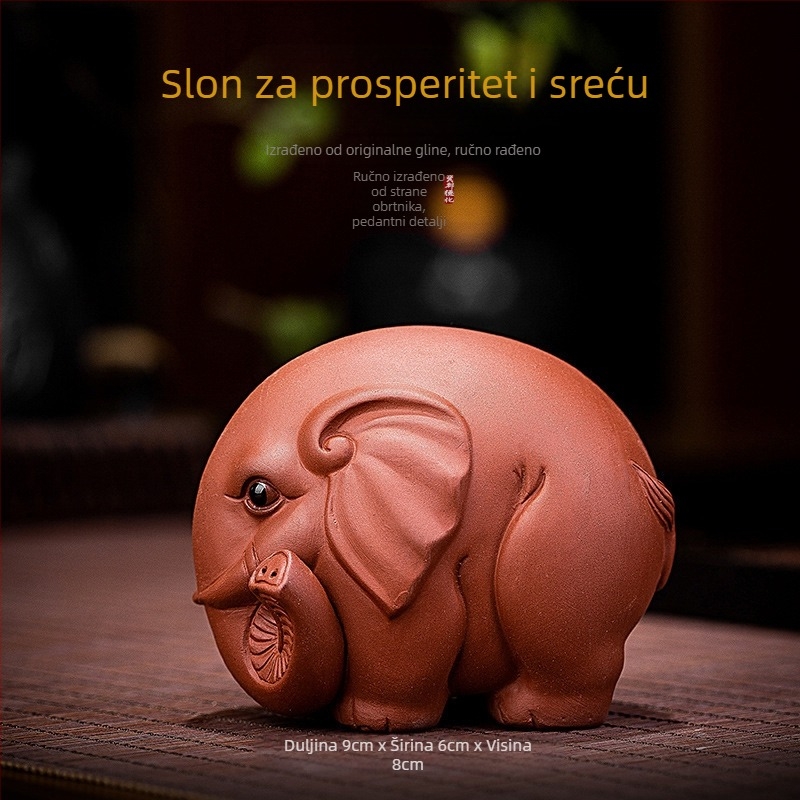 Ručni rad: teja figura od ljubičaste pijesčne gline, elefant – amulet za blagostanje, ukras na čajnom stolu