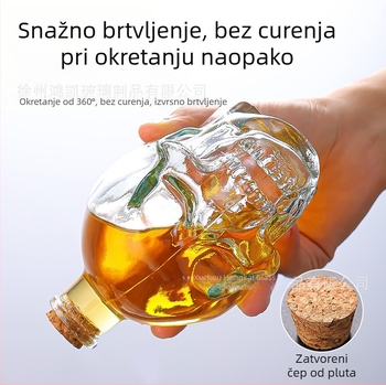 Stakleni set s bocama u obliku lubanje, čašama s lubanjom, dekantor i čaše za whisky