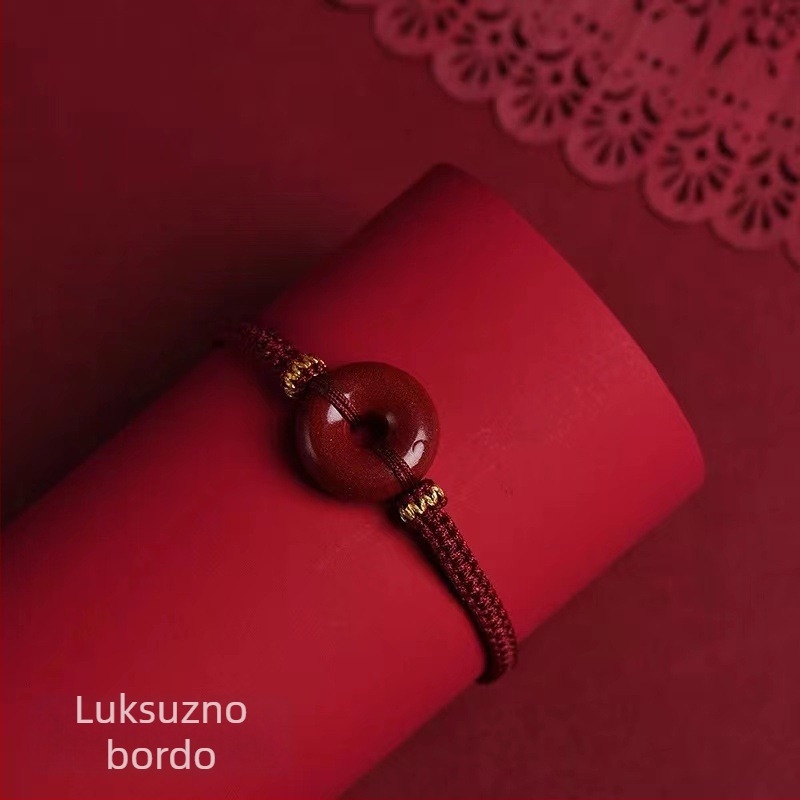 Unisex narukvica crvene boje s sigurnosnim kopčom, detalji od cinnabara i ljubičasto-zlatnog pijeska, privjesak zodijačkog znaka, amulet godišta rođenja