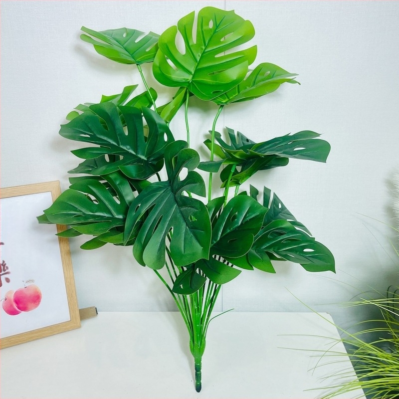 Umjetne biljke za kućni dekor: aranžman za dnevni boravak s Monstera deliciosa, banana biljka i Areka palma, skandinavski stil