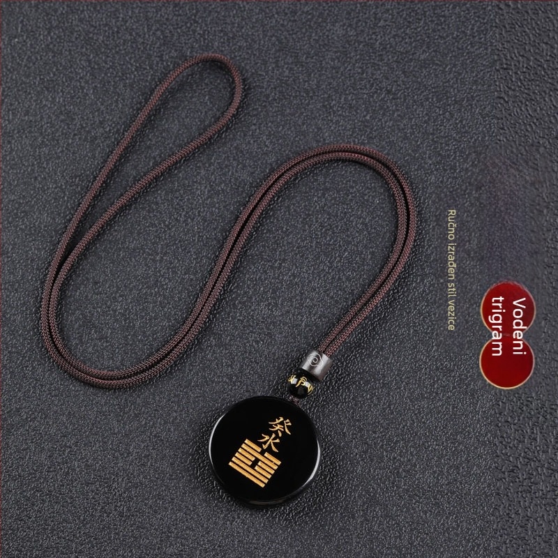 Gravirani obsidijan privjesak s vodnim elementom i energetski talisman