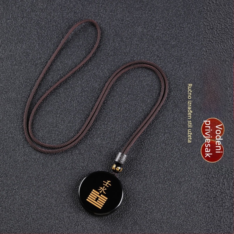 Gravirani obsidijan privjesak s vodnim elementom i energetski talisman