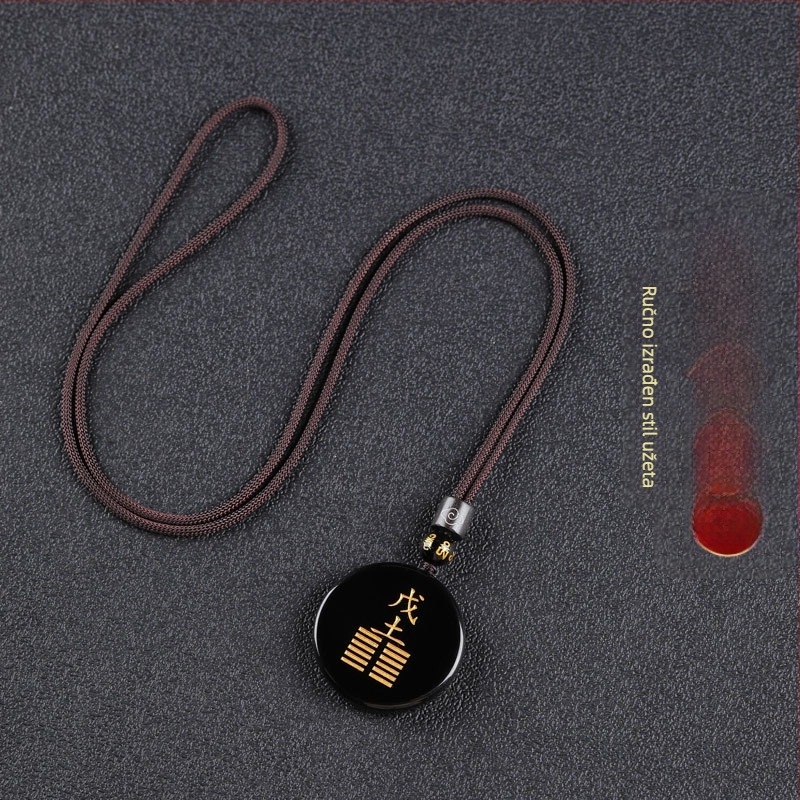 Gravirani obsidijan privjesak s vodnim elementom i energetski talisman