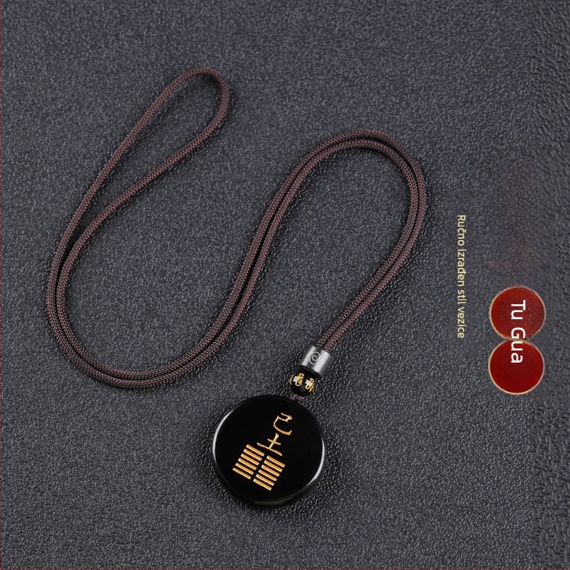 Gravirani obsidijan privjesak s vodnim elementom i energetski talisman