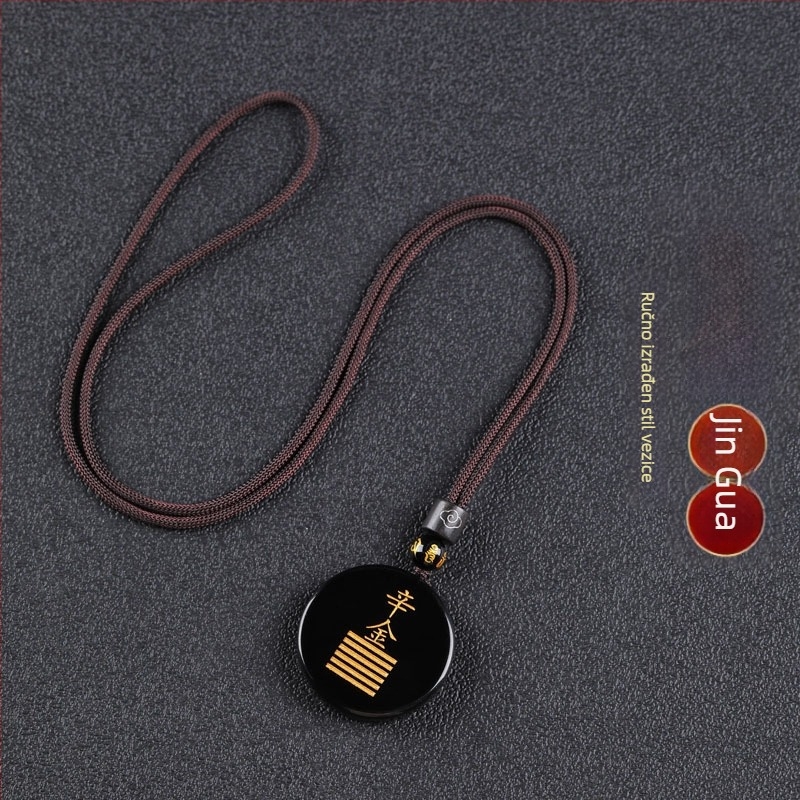 Gravirani obsidijan privjesak s vodnim elementom i energetski talisman