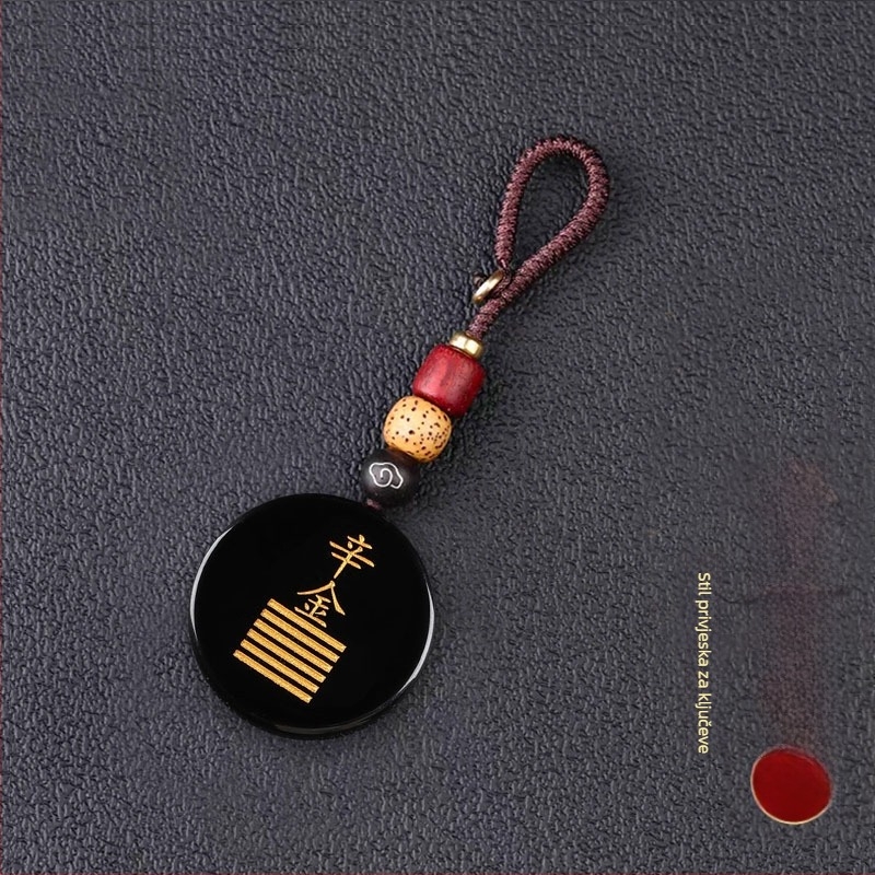 Gravirani obsidijan privjesak s vodnim elementom i energetski talisman