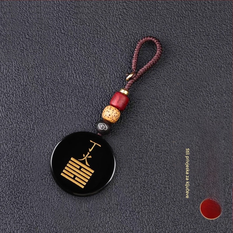 Gravirani obsidijan privjesak s vodnim elementom i energetski talisman