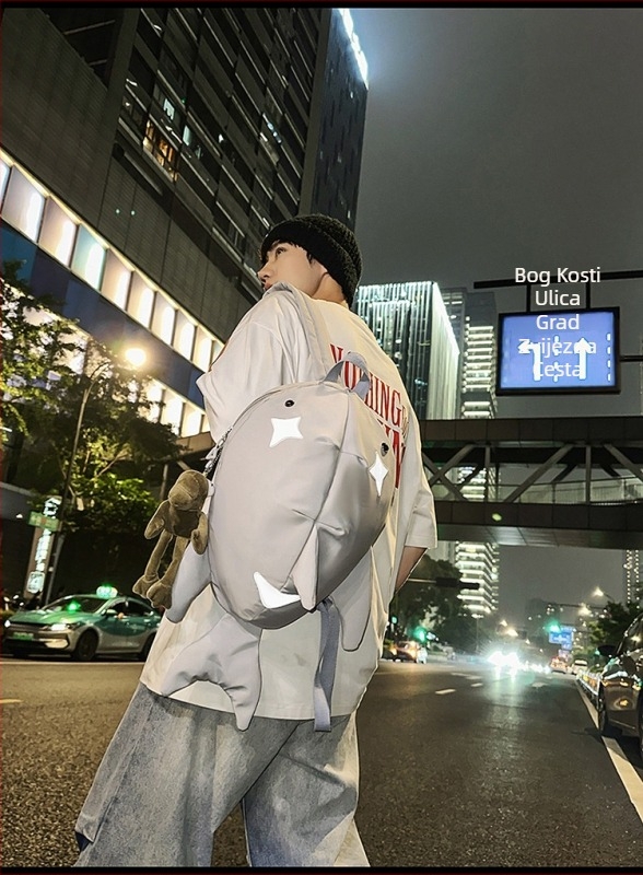 Ruksak s karikaturnim morskim psom u japanskom stilu, unisex, 2025 novi model, sladak i duhovit, velik kapacitet za školu i putovanja, može nositi 14-inčni laptop