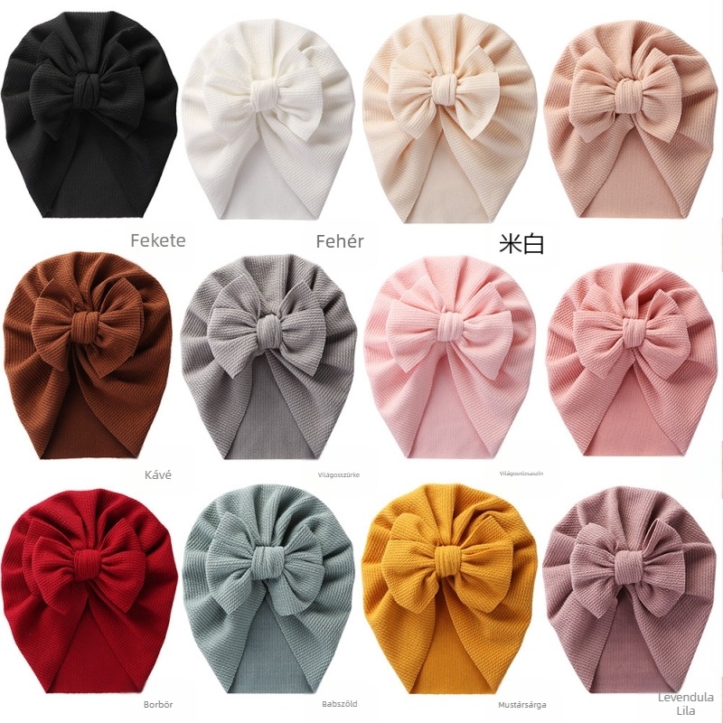 Európai és amerikai új baba tiszta színű pulóver sapka masnival, gyermek tavaszi és őszi indiai sapka kígyómintás baba határtalan sapka