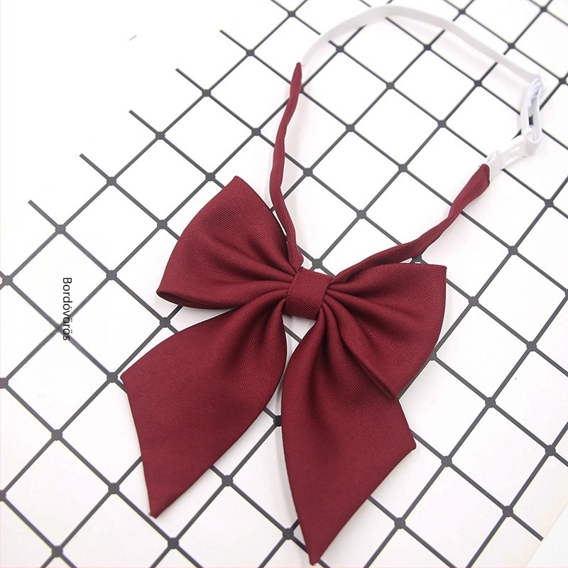 Raktáron lévő japán junior iskolai stílusú egyszínű masni, fekete hegyes tollgallér virág, átlós barna gallér virág gyerekeknek