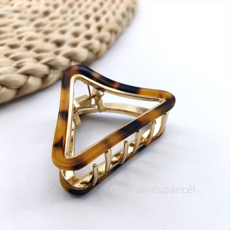 Hualin határokon átnyúló háromszög alakú ötvözetből készült fogócsat korongos hajcsat közepes üreges csíkos hajcsat temperamentumos ecetsavas fogócsat