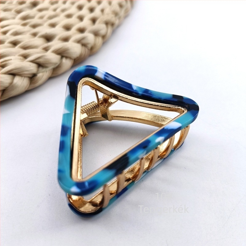 Hualin határokon átnyúló háromszög alakú ötvözetből készült fogócsat korongos hajcsat közepes üreges csíkos hajcsat temperamentumos ecetsavas fogócsat