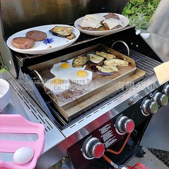 Rozsdamentes acél főzőlap, lapos tetejű betét, zsírzóvályú fogantyúval, gáz- és faszenes grillhez