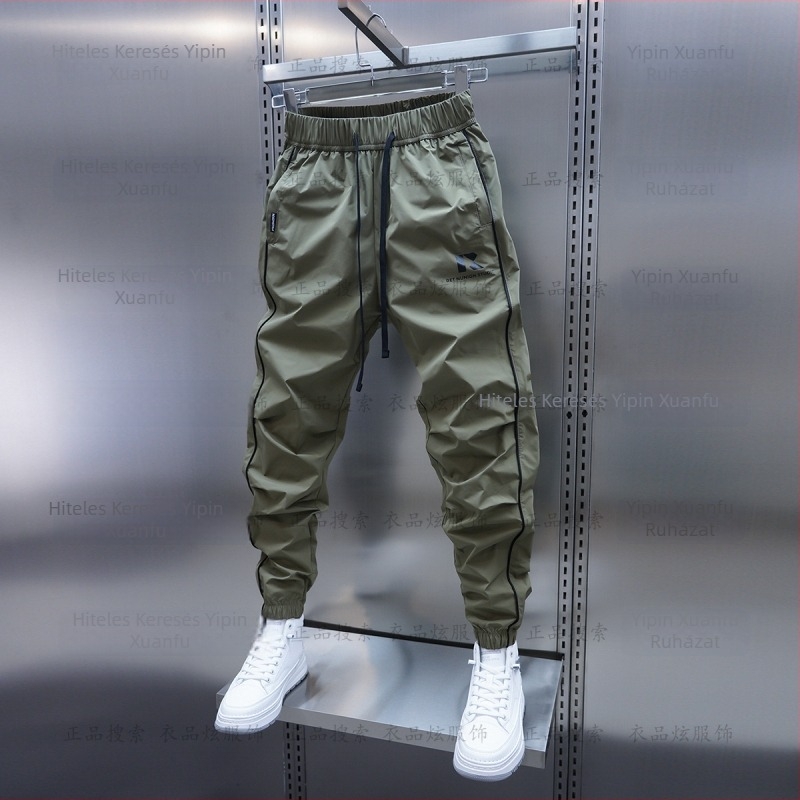 Tavaszi és őszi új férfi lezser nadrág koreai stílusú, gyorsan száradó, laza szárú, divatos, egyszínű, minden lábra illeszkedő nadrág