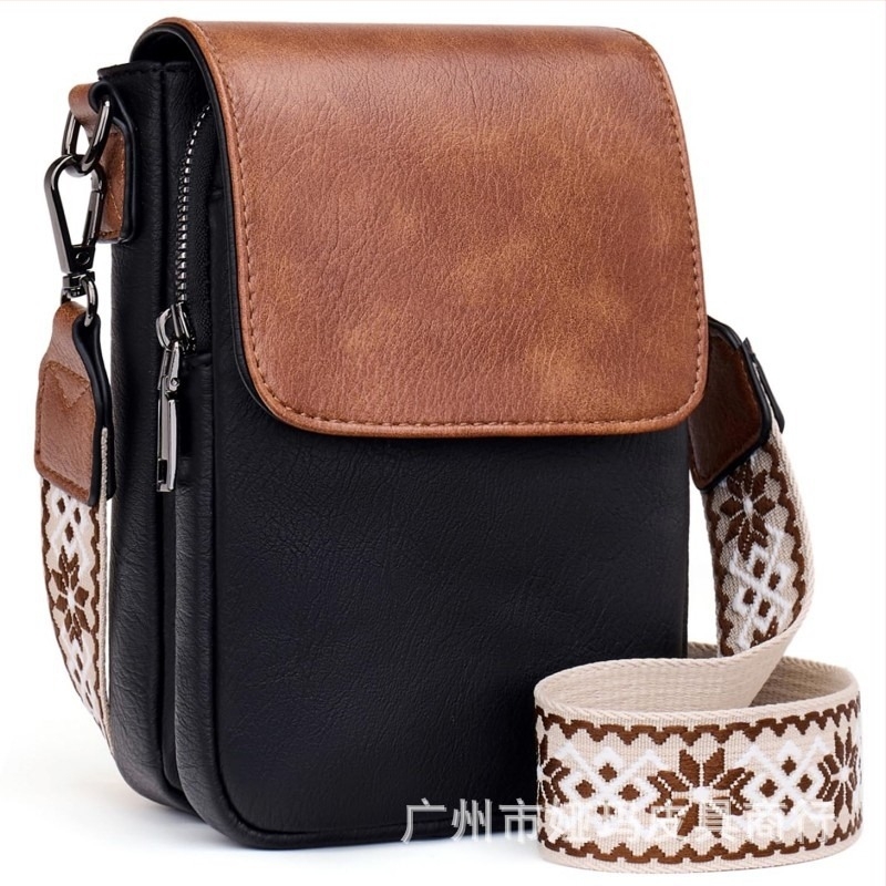 Valódi bőrből készült telefon táska, felső réteg marhabőrrel, cipzáras zárás, függőleges négyszög alakú forma, állítható vállpánt