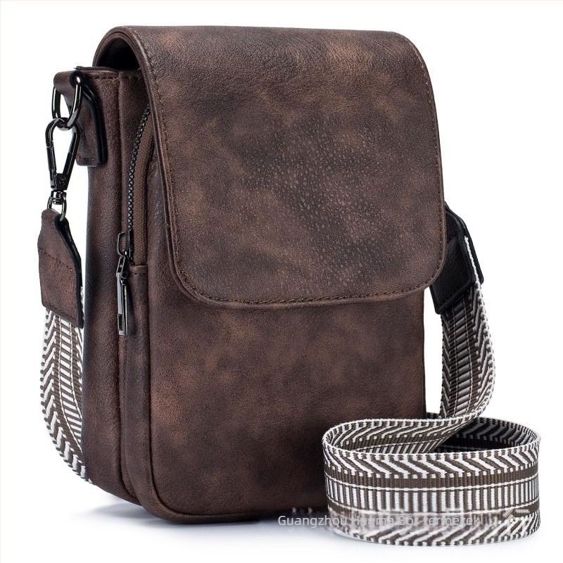 Valódi bőrből készült telefon táska, felső réteg marhabőrrel, cipzáras zárás, függőleges négyszög alakú forma, állítható vállpánt