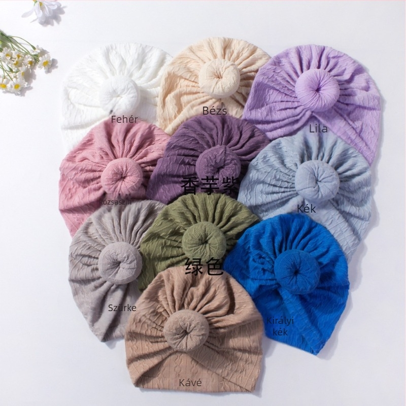 Babakapu kapucnis sapka jacquard mintával, fontanel védelme, kupolás forma, poliészter